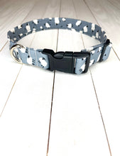 Load image into Gallery viewer, Dave the Sheep Collar. Light Grey dog collar with white and black sheep print over it. Black hardware with silver D ring. Lunapalooza logo on left hand side. Available in size puppy, small, medium, large and extra large.